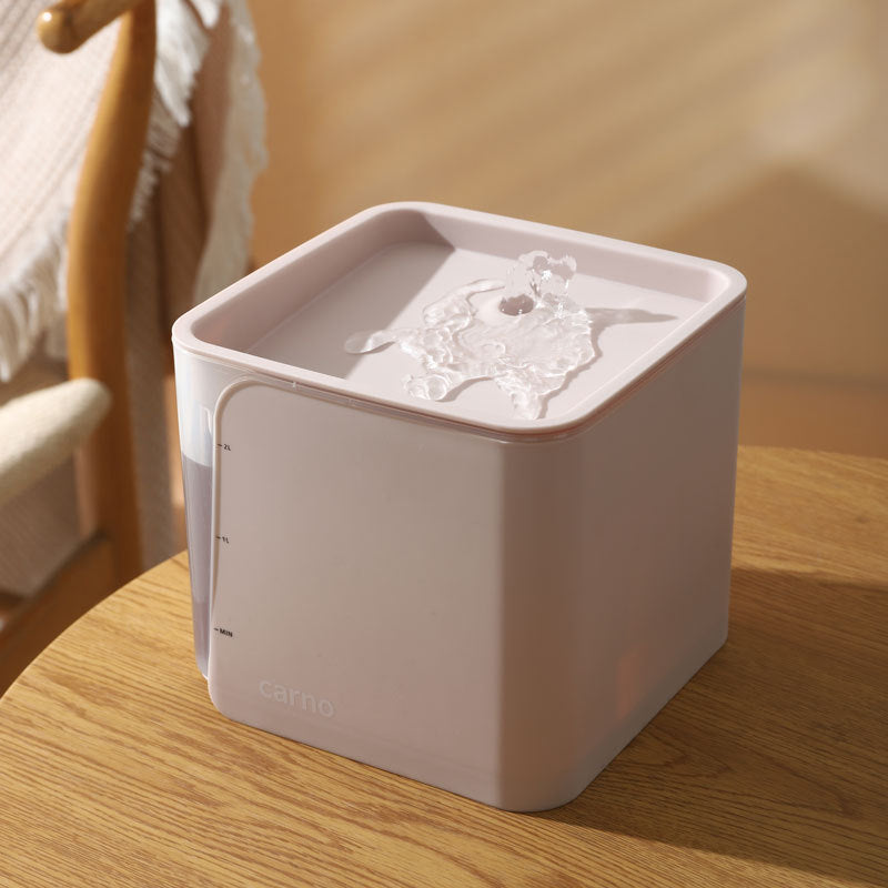 Dispensador automático de agua circulante para gatos.