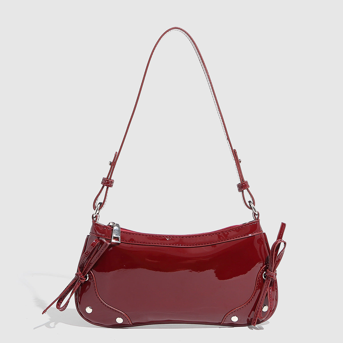 Bolso de hombro de color liso con doble lazo y diseño cuadrado pequeño.