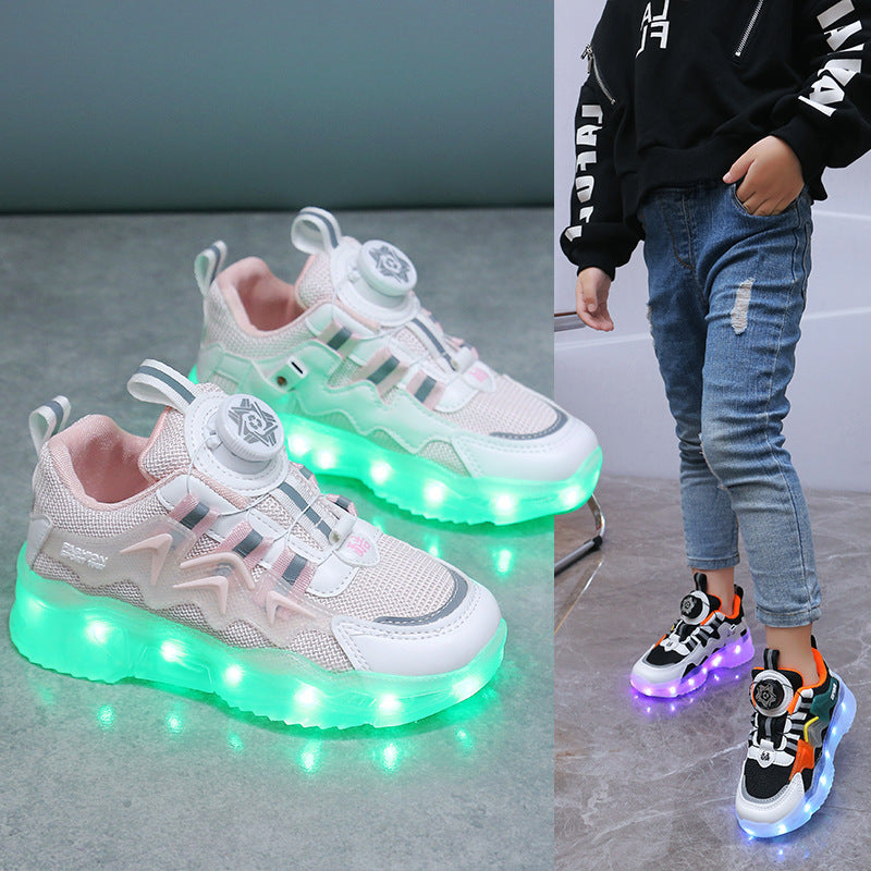 Zapatillas deportivas con luces y botones giratorios de carga de colores.