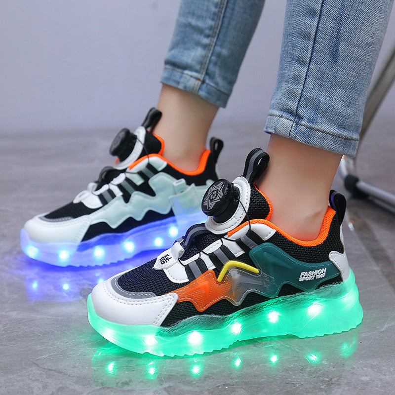 Zapatillas deportivas con luces y botones giratorios de carga de colores.