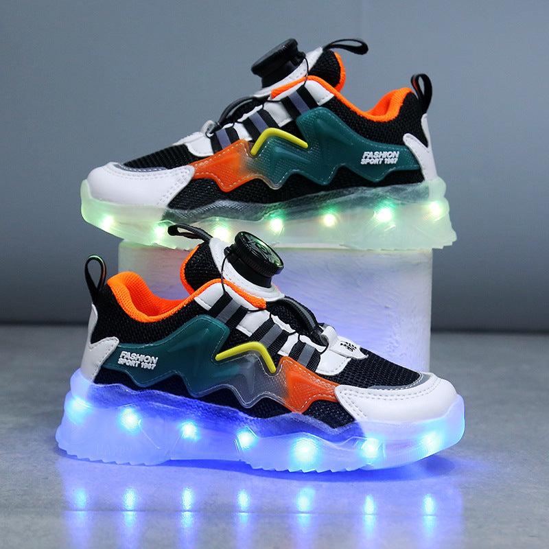 Zapatillas deportivas con luces y botones giratorios de carga de colores.