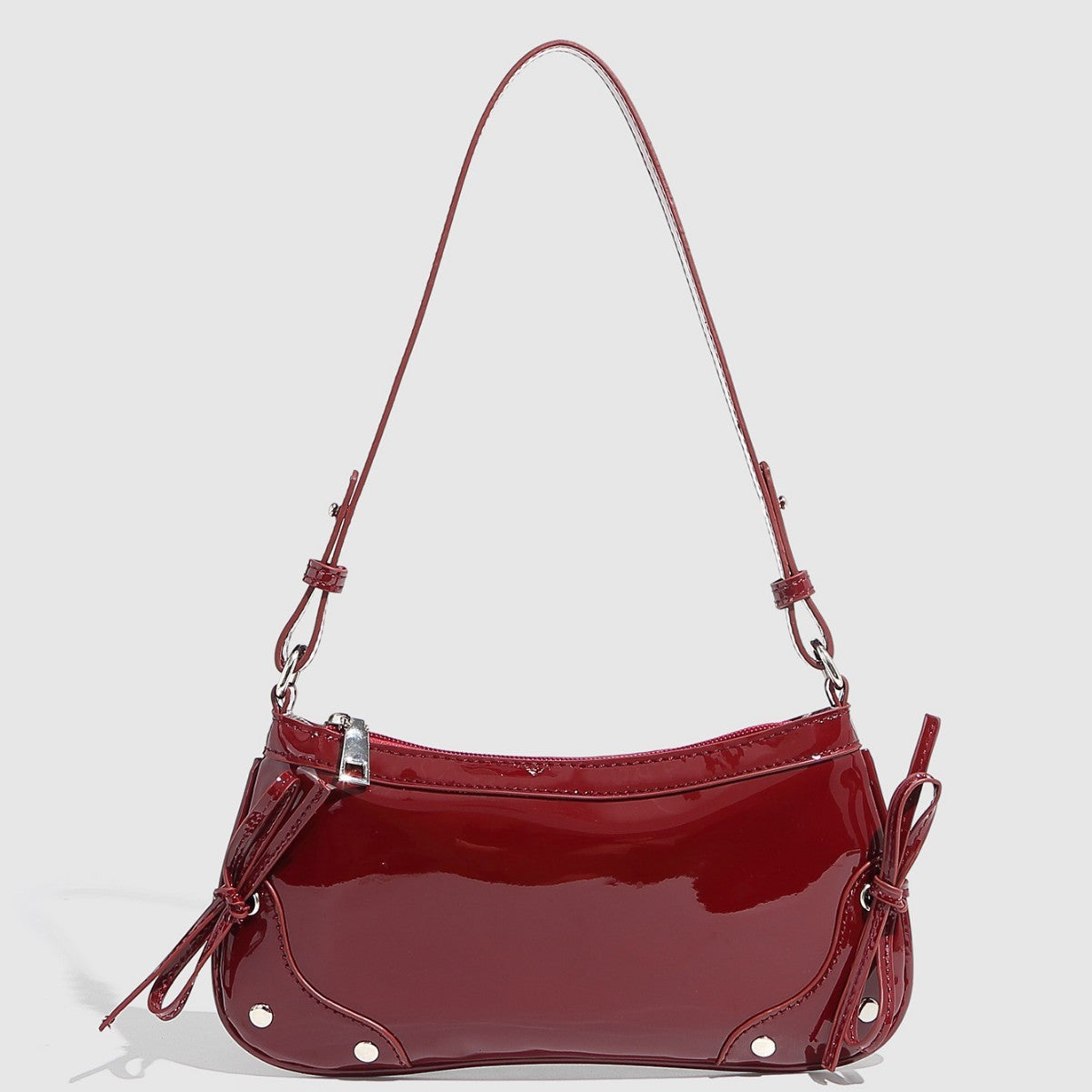 Bolso de hombro de color liso con doble lazo y diseño cuadrado pequeño.