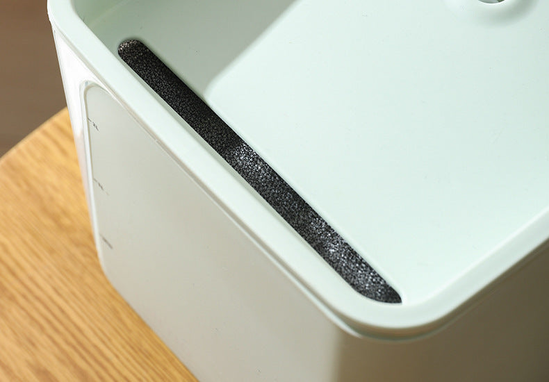 Dispensador automático de agua circulante para gatos.