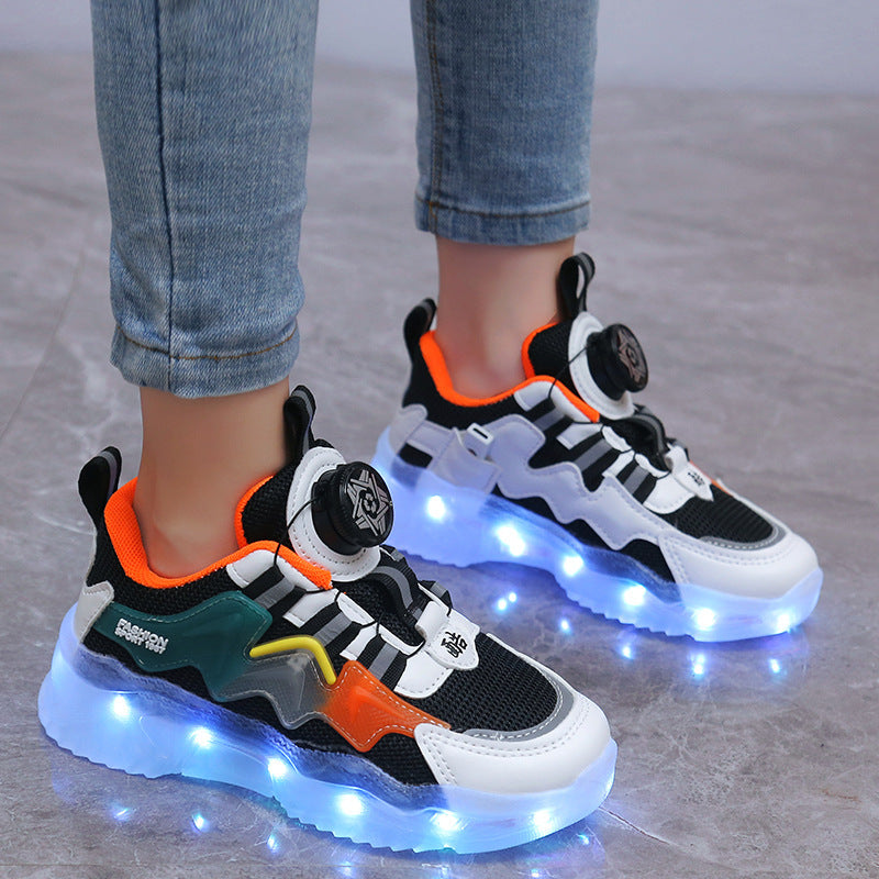 Zapatillas deportivas con luces y botones giratorios de carga de colores.